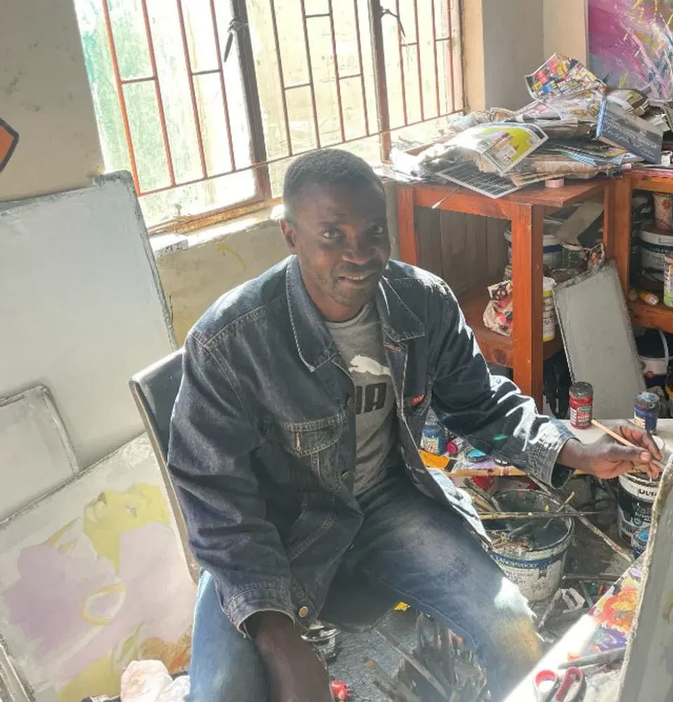 Israel, featured artist from Eastern Cape, South Africa, in his studio